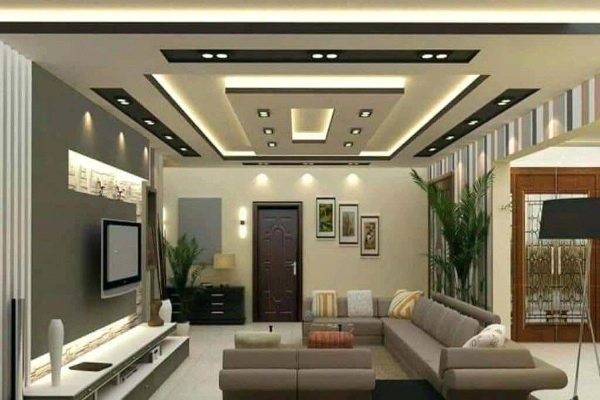 The TV Unit in the Center and Open shelves in Living Room