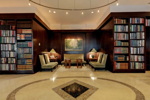 The TV Unit in the Center and Open shelves in Living Room